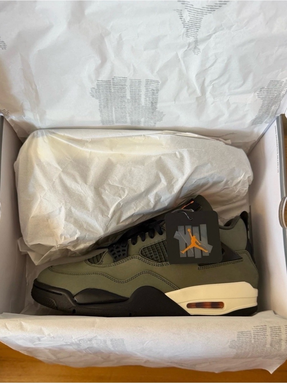 Jordan 4 Retro Undefeated DS          Olive Green and Black Leather Sneakers
